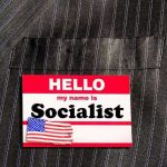 Seattle’s Socialist Mayor Stuns with Bold Agenda Hello my name is Socialist name tag on suit.