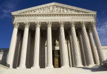 Supreme Court Stuns – Trump TRIUMPHS Facade of the Supreme Court building featuring tall columns and intricate carvings