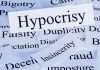 TOP DEMOCRAT SLAMS Pelosi — Hypocrisy Exposed! A collection of paper cards with various negative terms, prominently featuring the word Hypocrisy