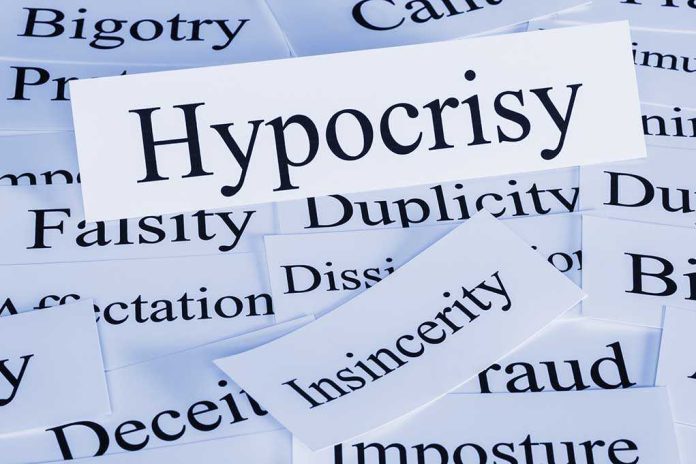 shutterstock_154458965.jpg A collection of paper cards with various negative terms, prominently featuring the word Hypocrisy