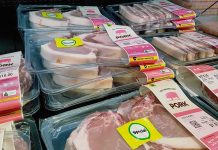 Various packaged pork products displayed in a grocery store