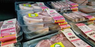 Various packaged pork products displayed in a grocery store