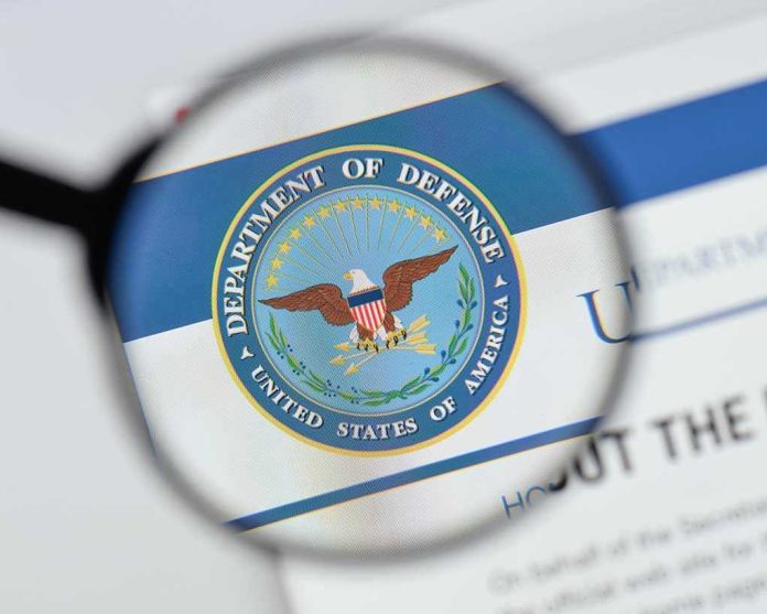 Magnifying glass over Department of Defense logo.