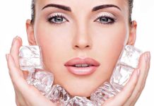 Lip Filler Trip Ends in Hot-Car Horror Woman holding ice cubes near her face.