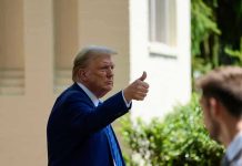 President Trump Vows ‘Very Serious Retaliation’ Man in suit giving thumbs up.