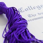 Professor’s SHOCKING Dismissal — Free Speech Crisis? Close-up of a purple graduation tassel next to a diploma