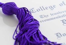 Professor’s SHOCKING Dismissal — Free Speech Crisis? Close-up of a purple graduation tassel next to a diploma