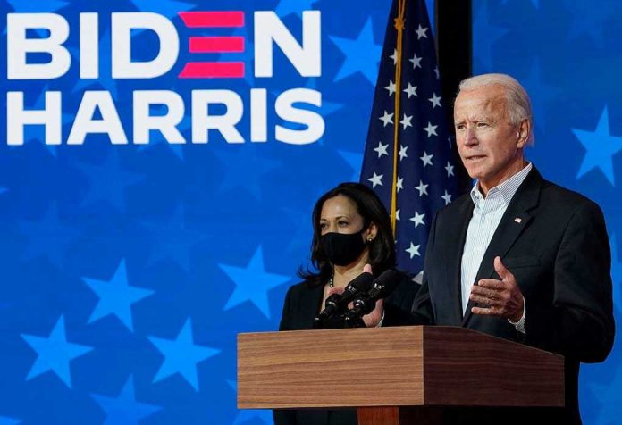 1849271638 Two people speaking at a Biden Harris event.