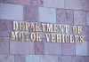 Sign for the Department of Motor Vehicles on a stone wall
