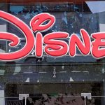 Disney Resort Horror: Man Caught On Video Bright red Disney logo displayed on a storefront window