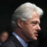 Democrats Ignore Clinton-Epstein Bombshell Ties Profile portrait of a man with gray hair in formal attire