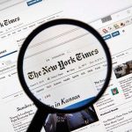 Democrat BLASTS NYT: Hamas Propaganda?! Magnifying glass over The New York Times website.