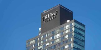 Why Trump Tower Tbilisi Is Sparking Political Firestorm View of Trump Towers, a modern skyscraper with a glass facade against a clear blue sky