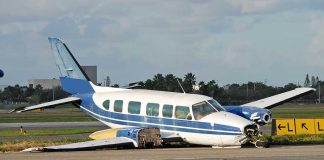 Raúl Castro Indictment: Shocking Sky Ambush Revelations Damaged blue and white small airplane on an airport runway