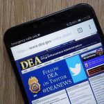 DEA website open on smartphone screen.
