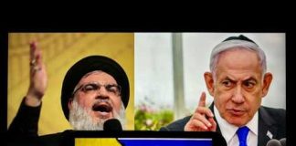 Two men with conflicting flags between them.