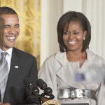 Grand Jury Drama: Obama Pulled In? Former President Barack Obama and Michelle Obama smiling at a public event