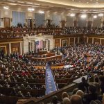 Shadow LLC Drains Union Cash Large assembly in a government legislative chamber.