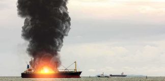 Ports Pounded, Risks Rocket Higher Cargo ship on fire with thick black smoke at sea