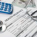 $1.4 Billion in Fake Medicare Claims Leads to Ohio Money Launderer Health insurance form with stethoscope, calculator, and cash