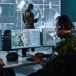 California City Declares Emergency After Crippling Cyberattack Military analysts at computers in a command center