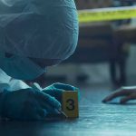 Mother and Two Transgender Biological Men Charged for Horrific Torture forensic investigator in protective suit examining crime scene markers