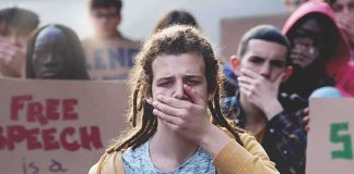 Ohio Teens Target the Ballot Box Protester covering mouth during rally