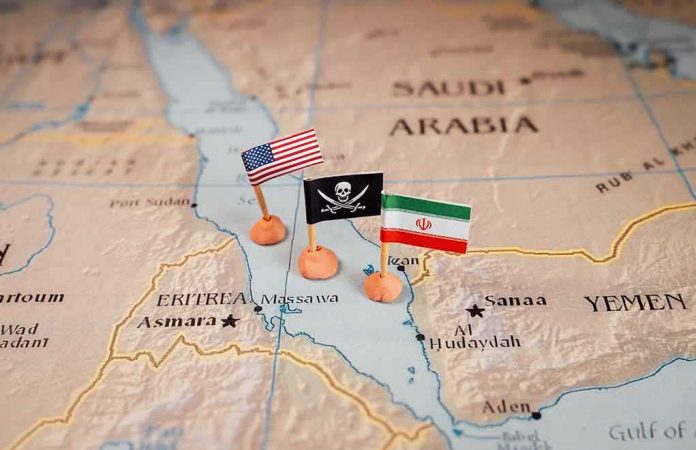 Map with US, pirate, and Iran flags near the Red Sea