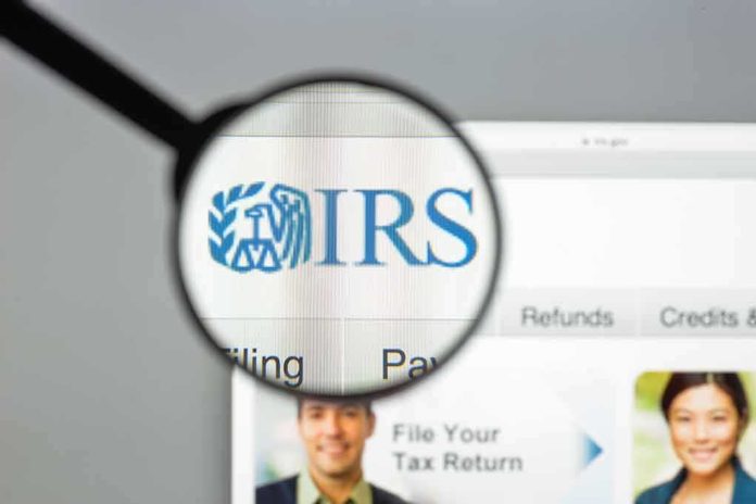 Magnifying glass highlighting IRS logo on a website