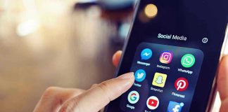 EU’s Social Media Ban Could Bring ID Checks for Adults Finger tapping smartphone social media app icons.