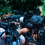 Why FDA Wants ‘Herbal Painkiller’ to Become a Schedule I Substance TV news cameras crowding together at an outdoor event