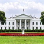 White House Targets an Unexpected D.C. Enemy The White House with fountain and red flower bed