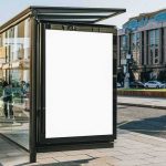 bus stop shelter with blank advertisement poster in city street