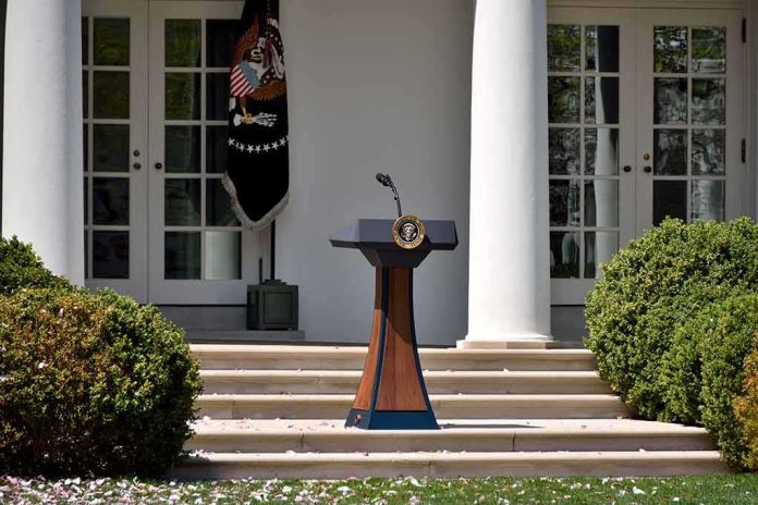 shutterstock_1070010710-1 Podium with presidential seal in a garden colonnade