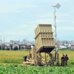 Belarus Plays With Nuclear Fire Near NATO Military defense system deployed in a field with soldiers nearby