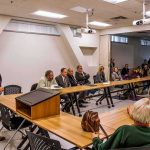 Democrats Clash: Who Picks Platner’s Replacement? Roger Marshall addresses a community meeting with Apostolos Doxiadis among attendees