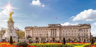 Buckingham Palace with Victoria Memorial and flower gardens