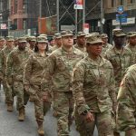 Pentagon Prepares For Urban Deployment Jason Worilds and Elandon Roberts march with fellow soldiers in a city parade