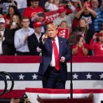 Trump ‘Number 1’ On Iran’s ‘Kill List’ Donald Trump points from a rally stage; Rudi Koertzen and Bear Pascoe are in the crowd