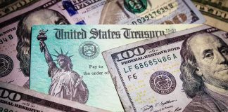GOP Senators Turn on Taxpayer Funded Trump Ads United States Treasury check on top of US dollar bills