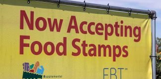 Court Ruling Forces SNAP Shutdown Yellow banner announcing acceptance of food stamps and EBT
