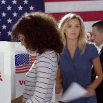 Senator Blunder Ignites Voter ID Uproar Voters at polling booths in front of an American flag