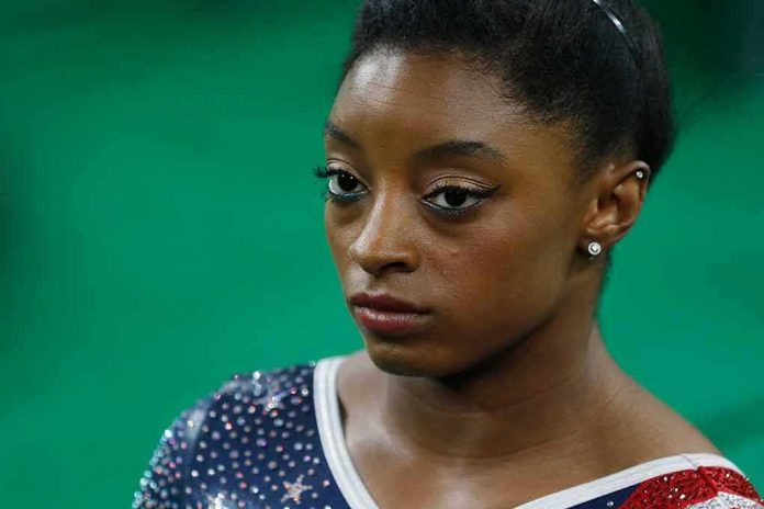 shutterstock_1770169481 Simone Biles in close-up wearing a sparkly gymnastics leotard