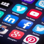 smartphone screen with social media app icons
