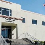 FBI Raids Ignite Minnesota Firestorm FBI office building with entrance steps and American flag