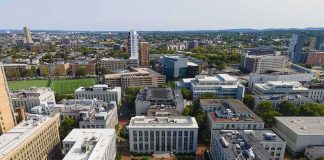 aerial view of a university campus quad with surrounding academic buildings