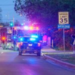 5 Shot Outside Virginia State University Dorms Emergency vehicles with flashing lights on a city street at night
