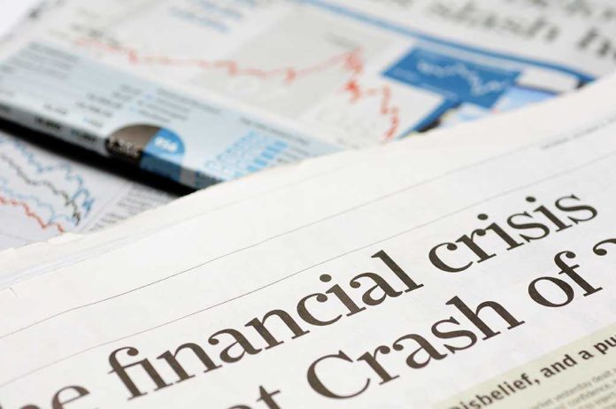 shutterstock_19814632 Close-up of a newspaper headline about a financial crisis