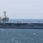 Trump Says Houthis Agreed Not To Fight U.S. Aircraft carrier sailing at sea