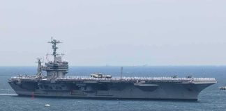 Trump Says Houthis Agreed Not To Fight U.S. Aircraft carrier sailing at sea